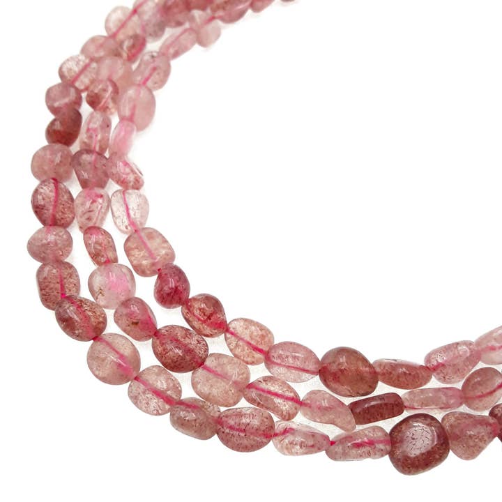 Strawberry Quartz Pebble Nugget Beads Approx 5-8mm 15.5" Strand and other Purchase Wholesale polished pebbles. Free Returns & Net 60 Terms on Faire trending on Faire.