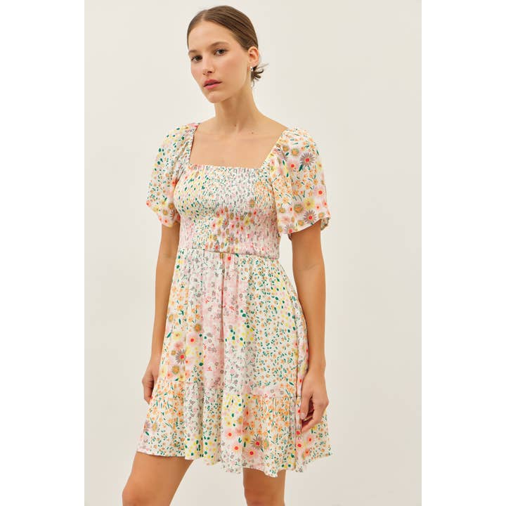 FLOWY RAYON GAUZE SMOCKED DITSY FLORAL MINI DRESS for wholesale on Faire