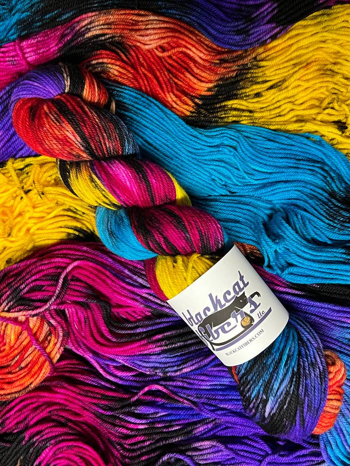 Rainbow In The Dark- Essential DK for wholesale by Black Cat Fibers