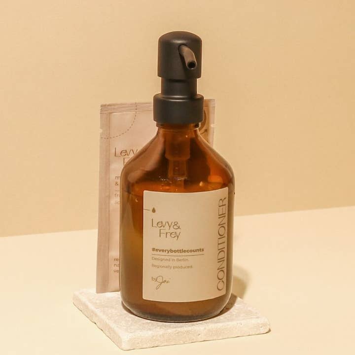 designer glazen conditioner fles voor wholesale door Levy & Frey