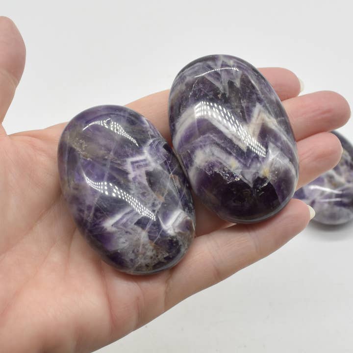 Purple Chevron Amethyst Crystal Palm Stone - 6 cm - 1 Count for wholesale on Faire4