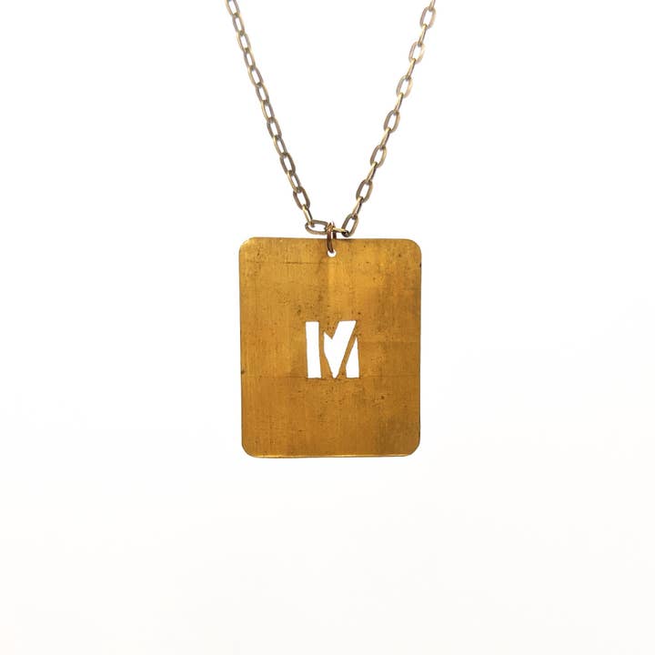 Vintage brass number and letter stencil necklace for wholesale by Amy Pfaffman Jewelry