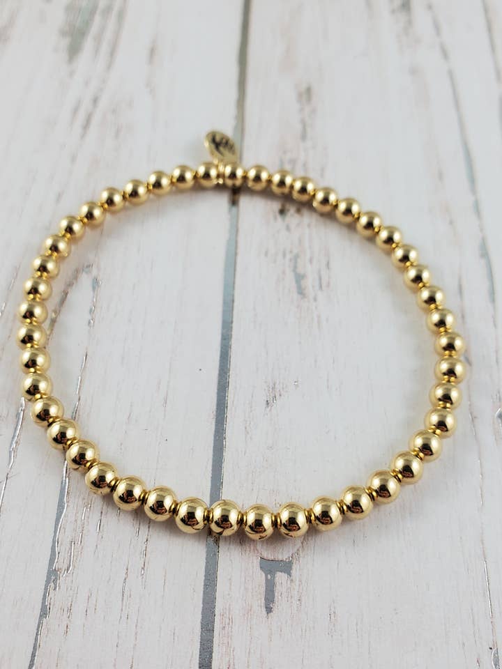 Bracciale con dettagli in oro per la vendita all'ingrosso da parte di Wanderbird