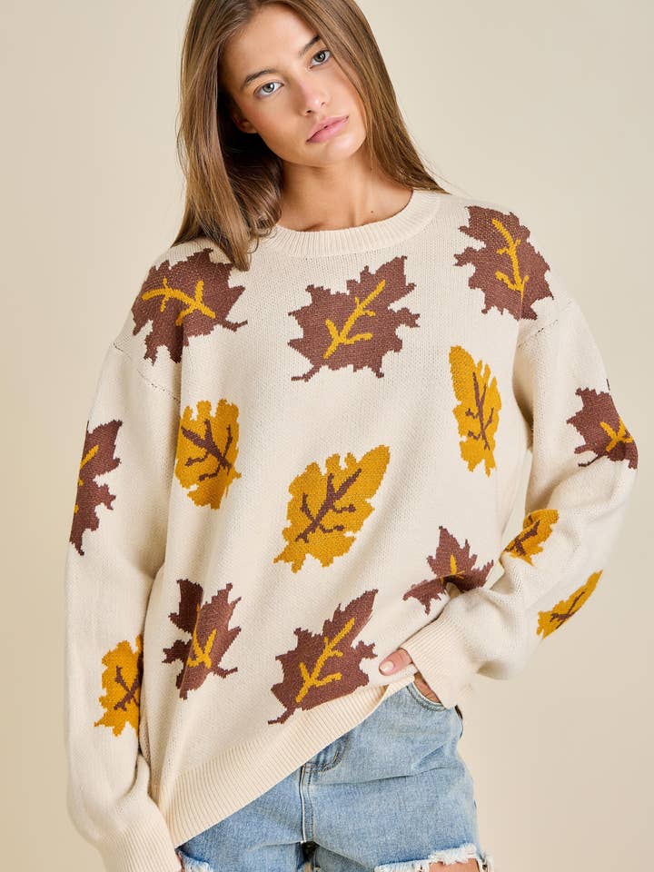 Klar til afsendelse efterårsblad-sweater – Hyggelig fra efterår til ferie for engroshandel hos Main Strip