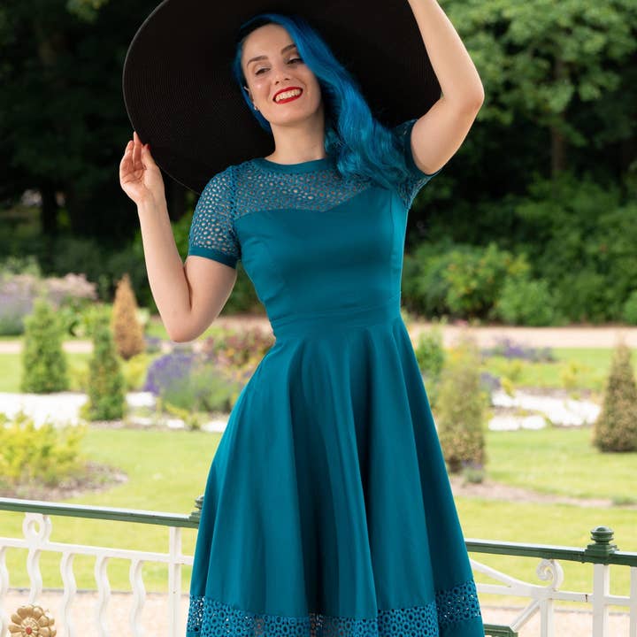 Tess Lace Sleeved Dress in Peacock Blue for wholesale by Dolly & Dotty