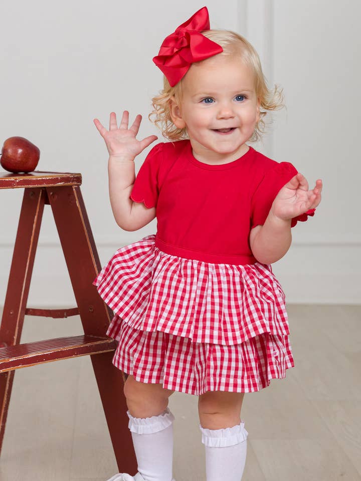 Baby Girls Classic Red Gingham Short Sleeve Skirted Romper and other Purchase Wholesale red gingham shorts. Free Returns & Net 60 Terms on Faire trending on Faire.