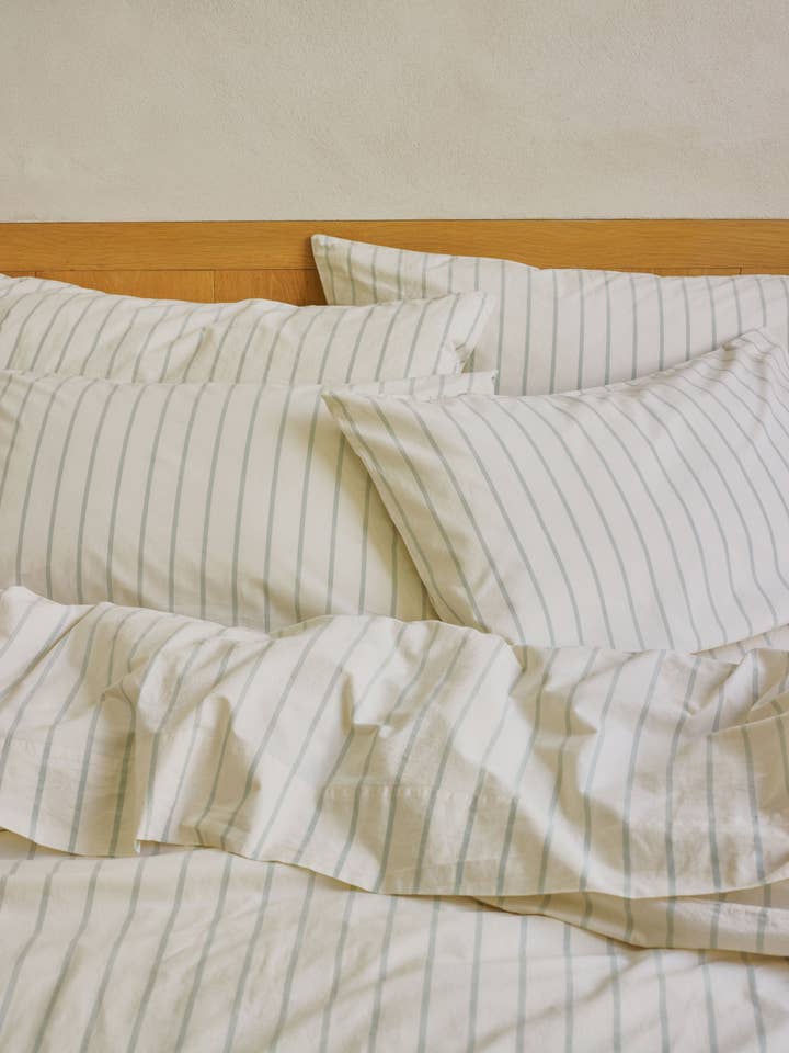 Mellow Green Slumber Stripe Cotton Pillowcases (Pair) for wholesale by Piglet in Bed USA