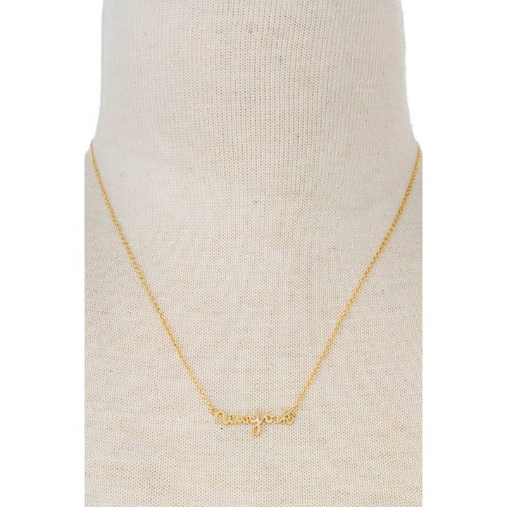 GOLD NEY YORK SCRIPT NECKLACE for wholesale on Faire