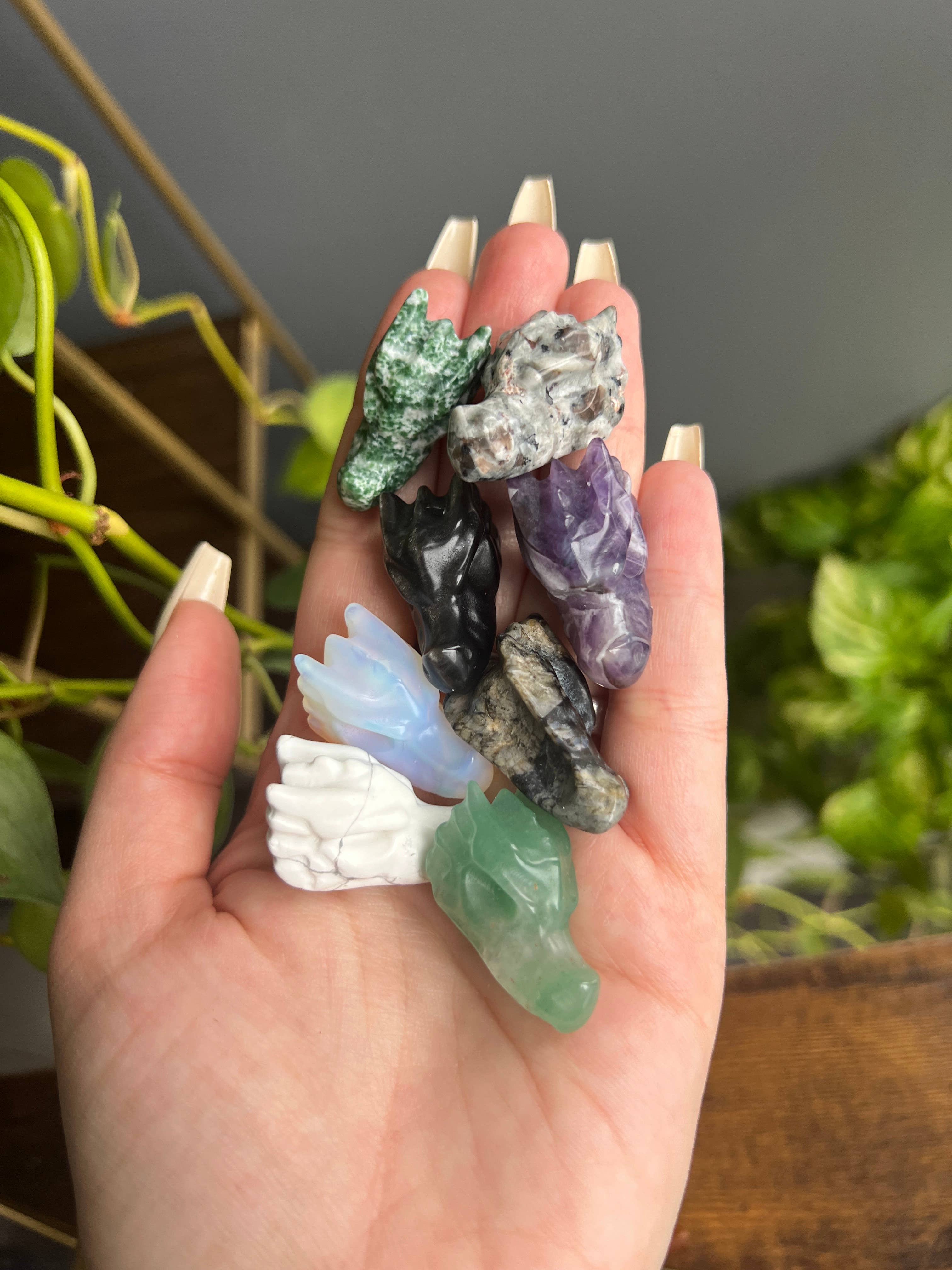 Sapphire & Sage – wholesale Spiritual stone/crystal – Red Que Sera Crystal Dragon Head Carving1