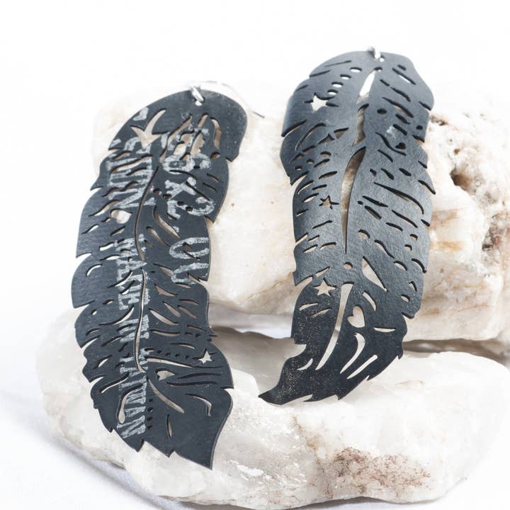 Brinco Borracha Lori “Penas da Paz” por atacado de ABD Culture