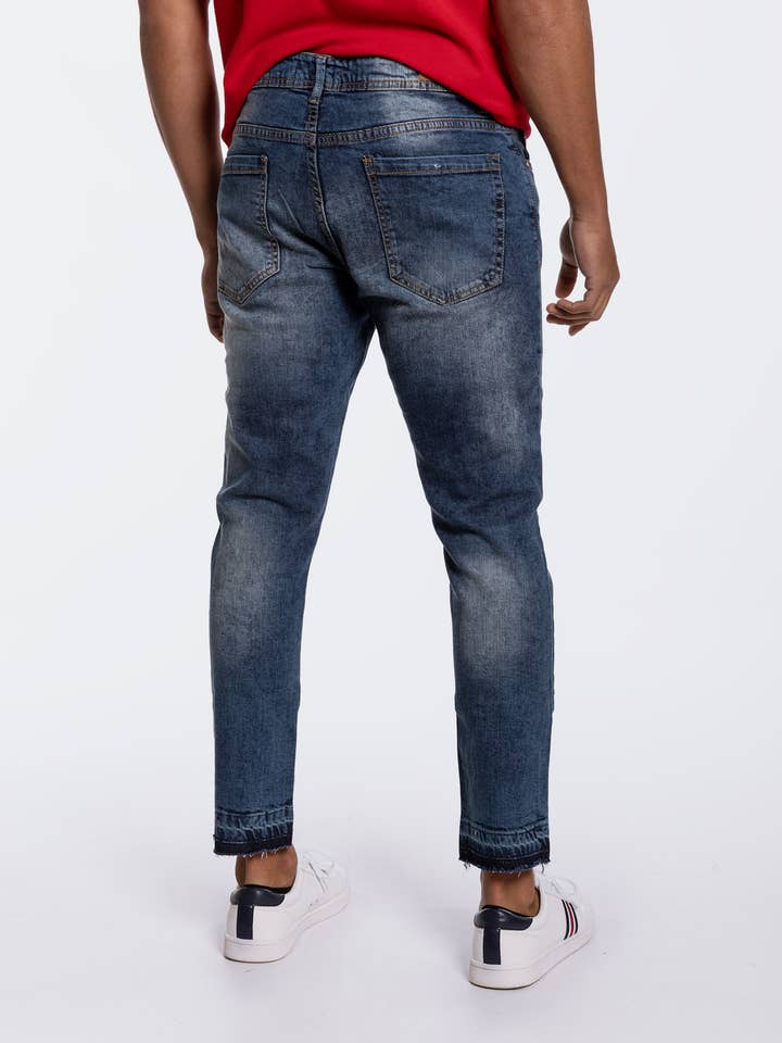 Slitna skinny jeans med obrutna fållar för wholesale av CELOPMAN