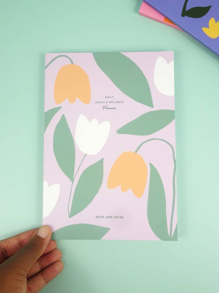 Daily Goals and Wellness Planner (Lilac Flowers) for wholesale by Note and Shine