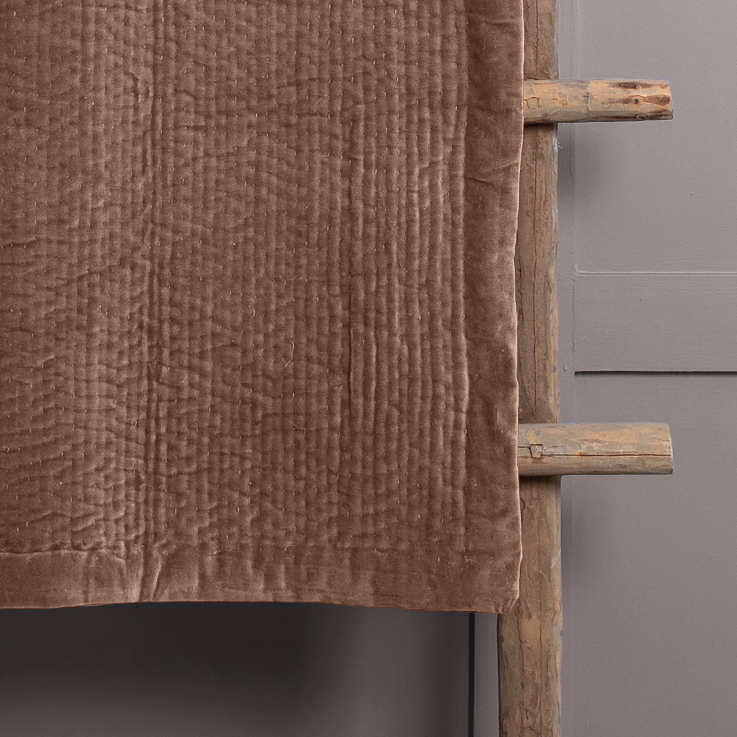 Haze Velvet Quilted Throw Coral for wholesale on Faire1