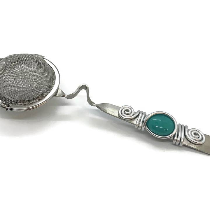 Mesh Tea Ball with Cup Rest Handle, Loose Tea Infuser for wholesale by Swiddles Inc