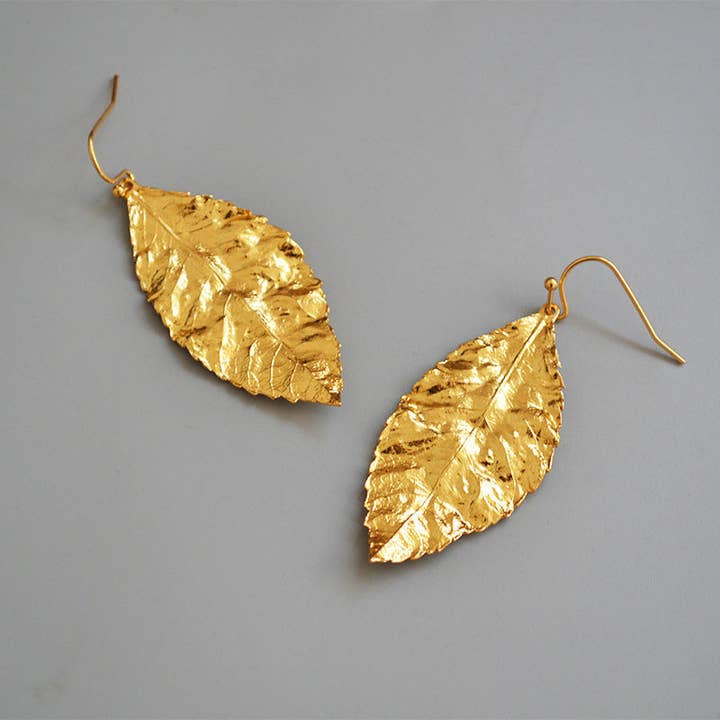 Revelari - Wholesale Dangle Earrings - Gold Leaf Earrings – Elegant Design