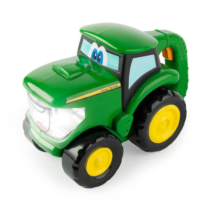 TOMY John Deere Johnny Tractor Toy and Flashlight and other Purchase Wholesale tomie. Free Returns & Net 60 Terms on Faire trending on Faire.