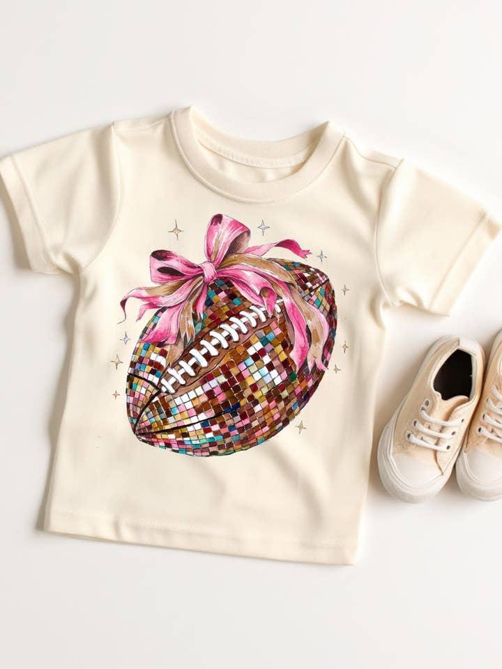 Football with bow for wholesale by Buckin Baby Wholesale