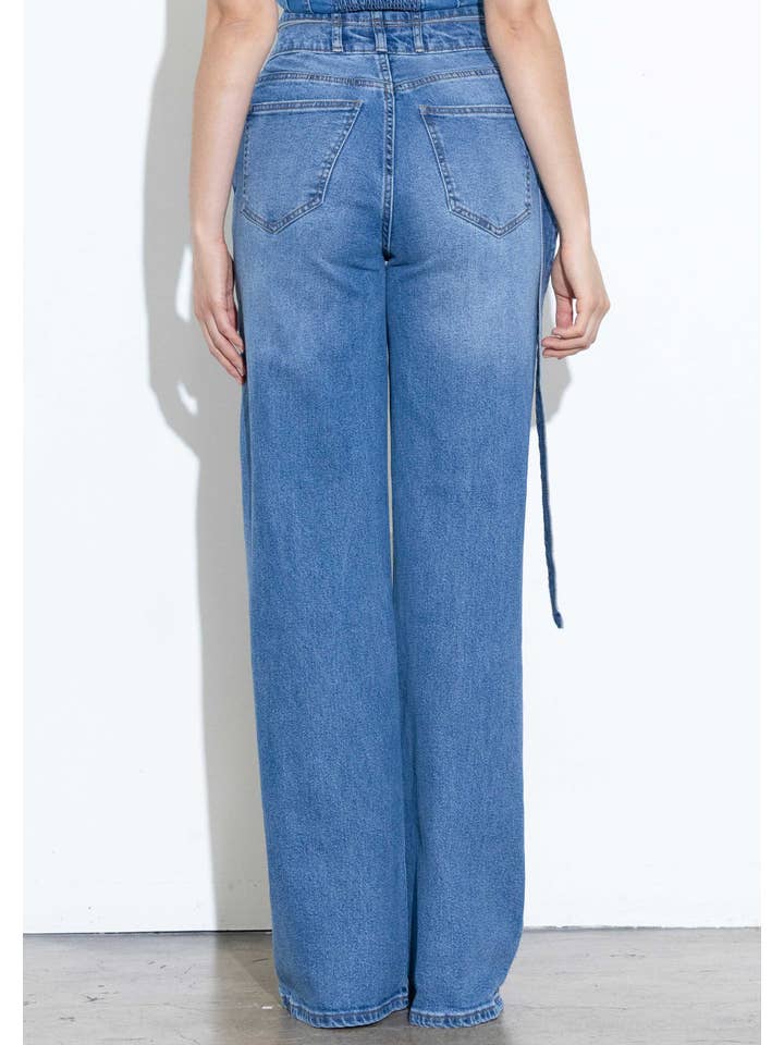 Pierre moyenne Jeans à jambes larges à taille croisée en vente sur Faire5