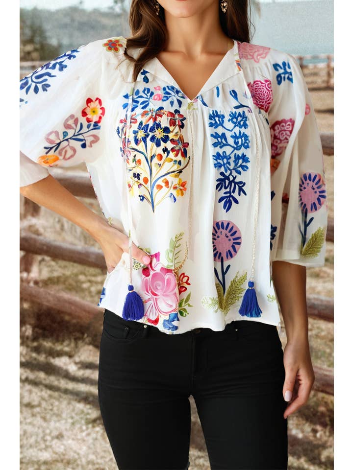 As shown Fashion-W Boho Floral Fringe Tie V Neck Blouse for wholesale on Faire