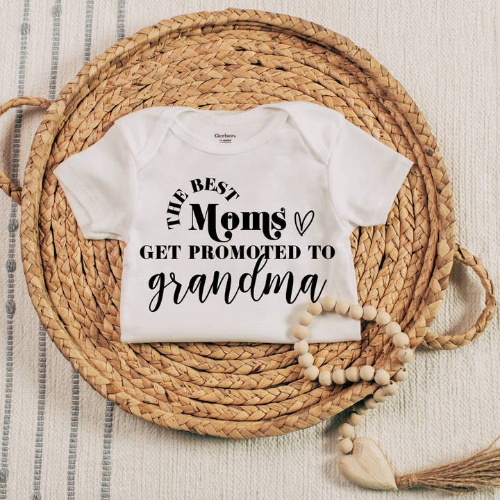 Best Moms Get Promoted Onesie® for wholesale by ZZ Threadz