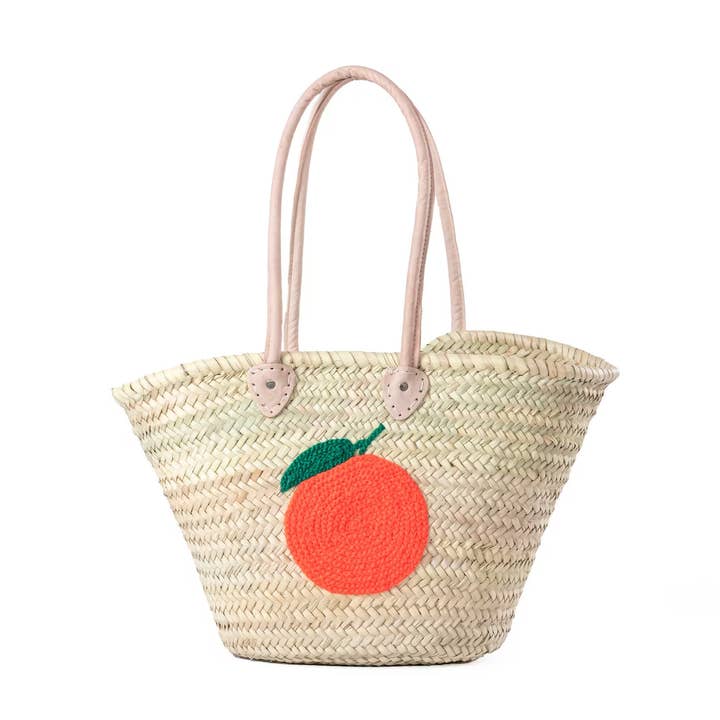 Straw Tote Basket With Leather Handles for wholesale by HandHappiness