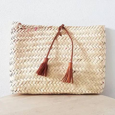 Moroccan straw clutch with leather for wholesale by Terracotta Design LTD
