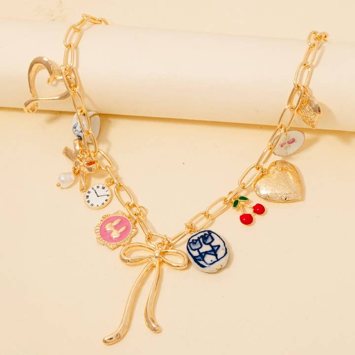 GD Assorted Floral Heart And Bow Charms Chain Necklace for wholesale on Faire