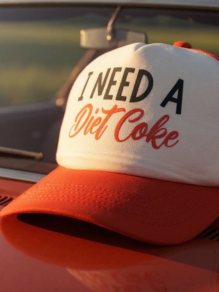 I Need A Diet Coke Trucker Hat for wholesale by Gambi's Tees