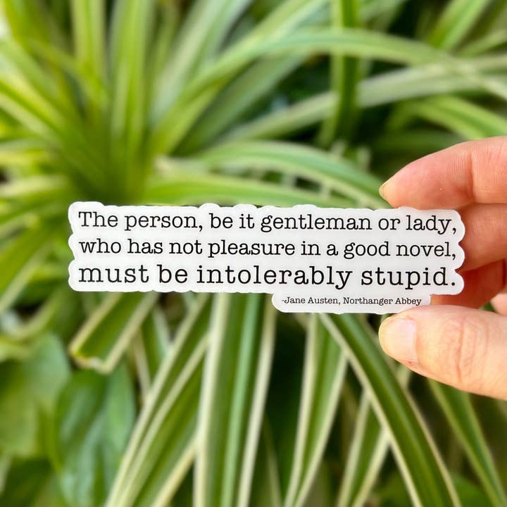 "The pleasure of a good novel" Sticker for wholesale by Fritz + Key