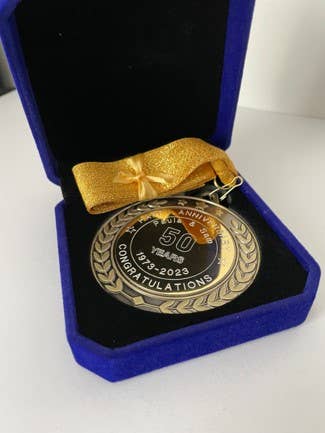 Custom Engraved Any Year Anniversary Medal In Velvet Box for wholesale by Medal Envy