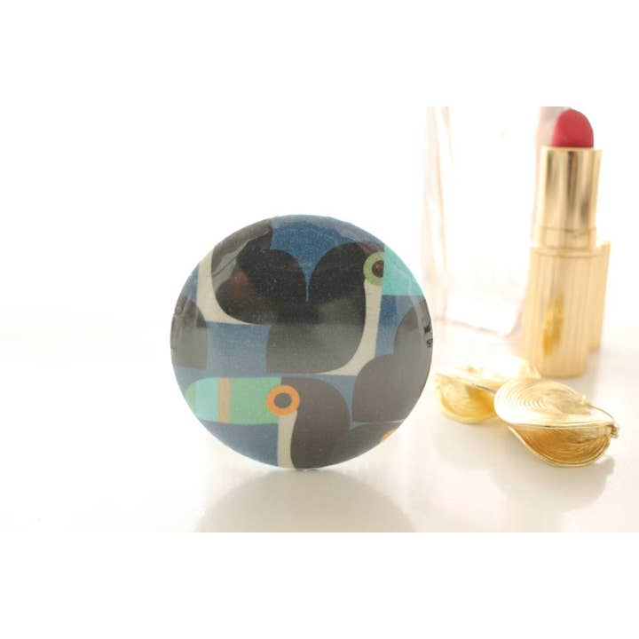 Bella blue toucan pocket mirror for wholesale by Sabrina Trefle