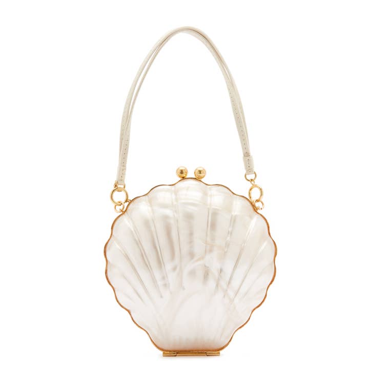 IVORY ACRYLIC SHELL CLUTCH and other Purchase wholesale frozen pie shells. Free returns & net 60 terms on Faire trending on Faire.