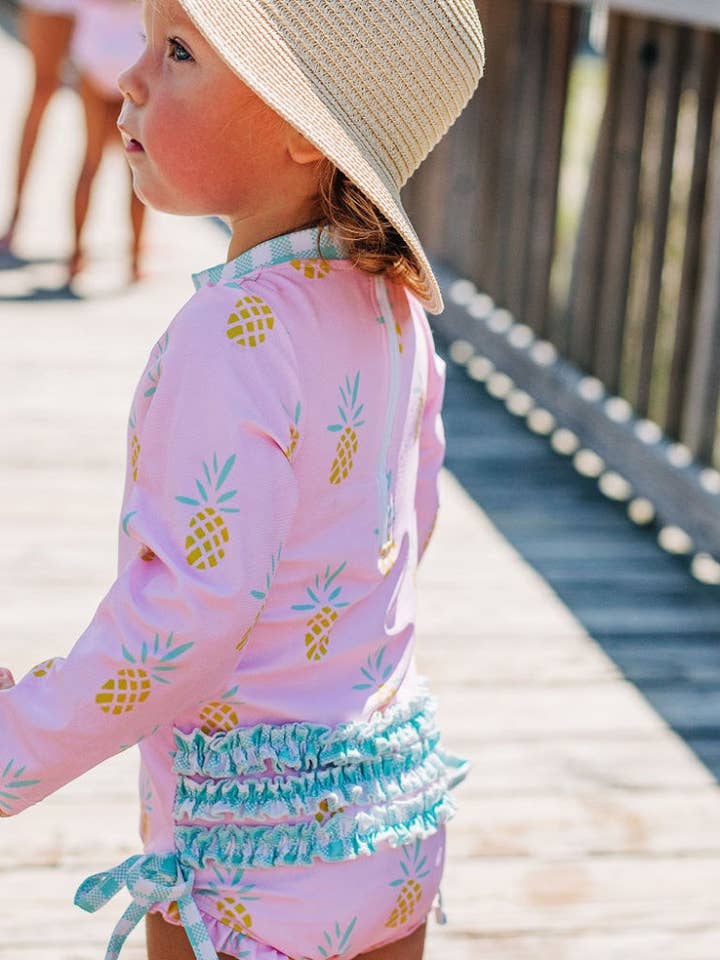 Girls Swimsuit - Ruffle Bottom - Pink Pineapple for wholesale by Sugar Bee Clothing