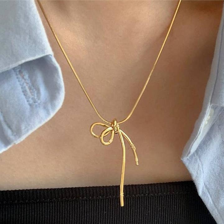 BASIC BOW FRESH AND SWEET NECKLACE_CWAJE1597 for wholesale by ACCITY