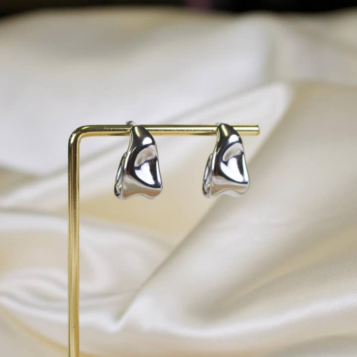 Capri // Silver Hammered Wave Earrings for wholesale by TISH jewelry