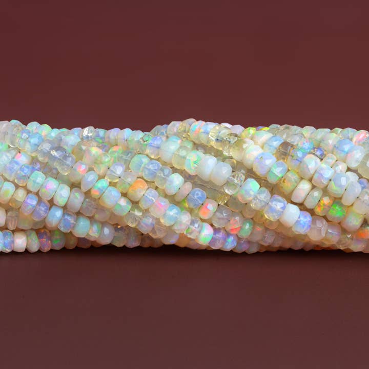 4-7mm Ethiopian Opal Faceted Rondelles 15 inch 145 beads for wholesale by The Bead Traders