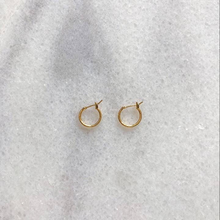 Mini Lizzy Hoop Earrings and other Purchase Wholesale lizzy. Free Returns & Net 60 Terms on Faire trending on Faire.