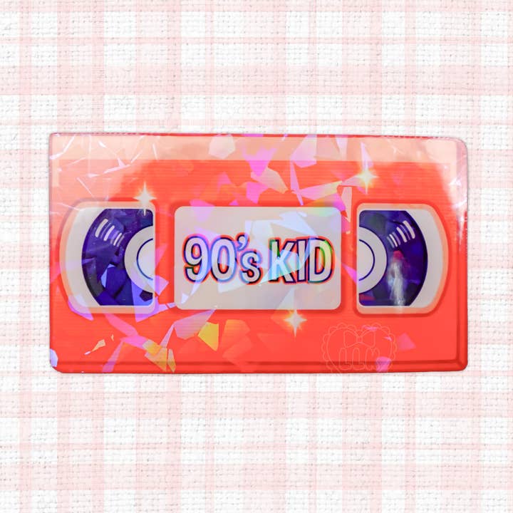 Holographic Orange VHS tape 90's Kid Vinyl Sticker for wholesale by LooLooKazoo