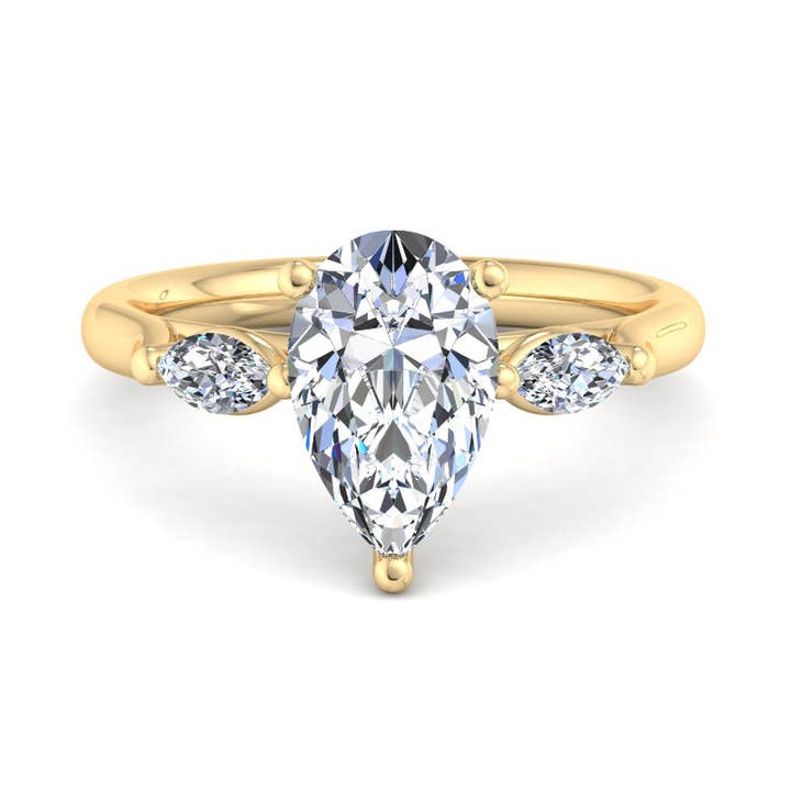 Classic Pear-Cut Center with Side Accents Lab Grown Diamond Center Engagement Ring for wholesale by Caratina