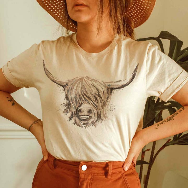 THE LATTIMORE CLAIM - Wholesale Screen Printed T-Shirt - Women's - Hand Drawn Highland Cow - CREAM