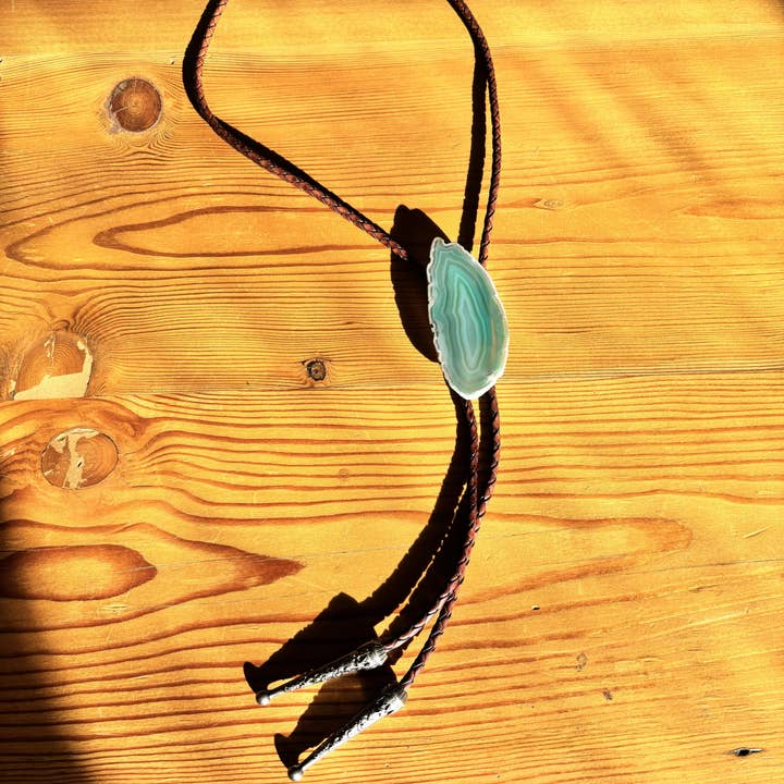 mahogany cord pewter tips Sage Bolo Tie for wholesale on Faire