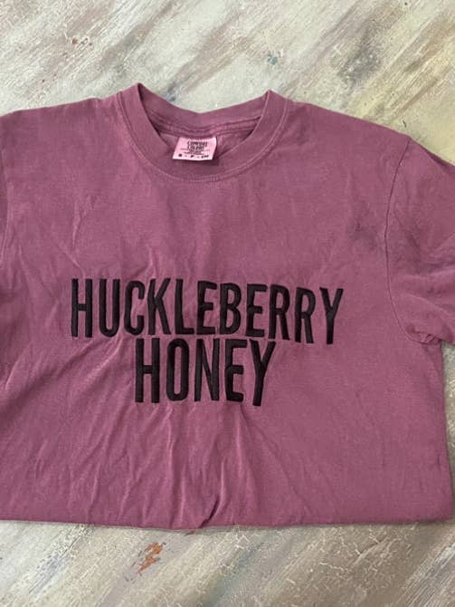 Huckleberry Honey Embroidered Short Sleeved T-shirt for wholesale by Emerald and Evergreen