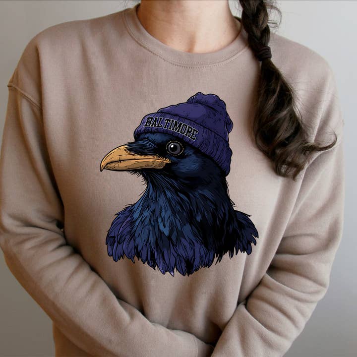 Baltimore Beanie Raven Cartoon Unisex Sweatshirt for wholesale by Into The Desert