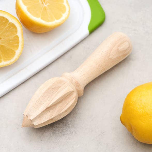 TRUE - Wholesale Juicer - Juice 6.5" Natural Wood Hand-Held Citrus Reamer / Juicer