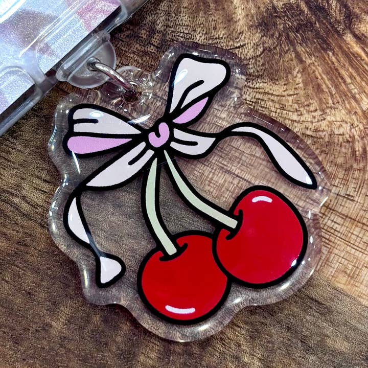 Cherries & Bow USB-C Dust Plug Charm for wholesale by Posh Paperie