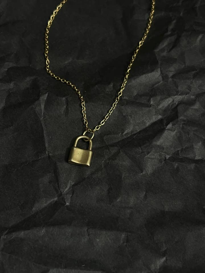 Pad lock necklace for wholesale by Bare Bones Jewelry London