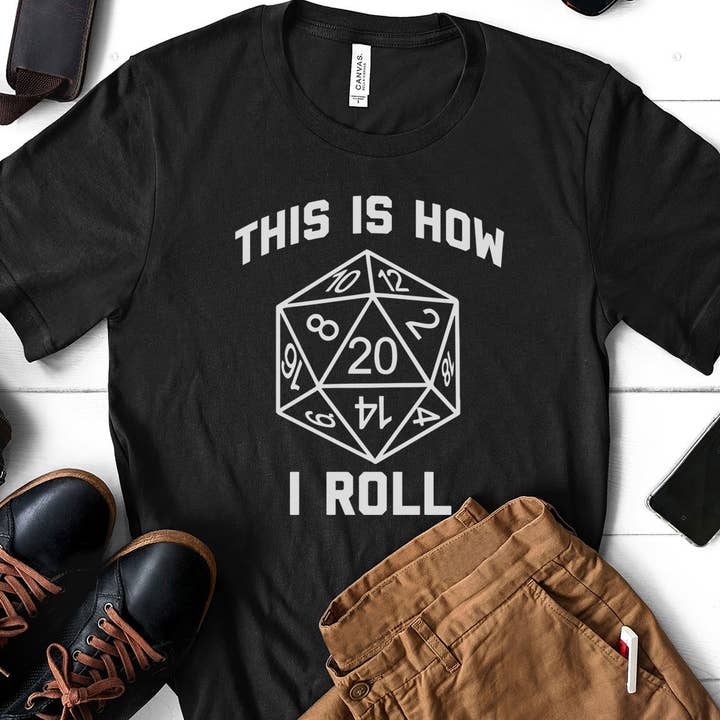 This Is How I Roll - Dungeons & Dragons Pun Nerd T-Shirt and other Purchase Wholesale geek. Free Returns & Net 60 Terms on Faire trending on Faire.