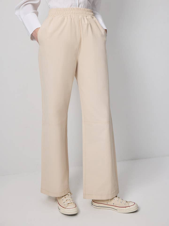 PANTALON LARGE EN MÉLANGE DE COTON AVEC TAILLE ÉLASTIQUE pour la vente par Touché Privé