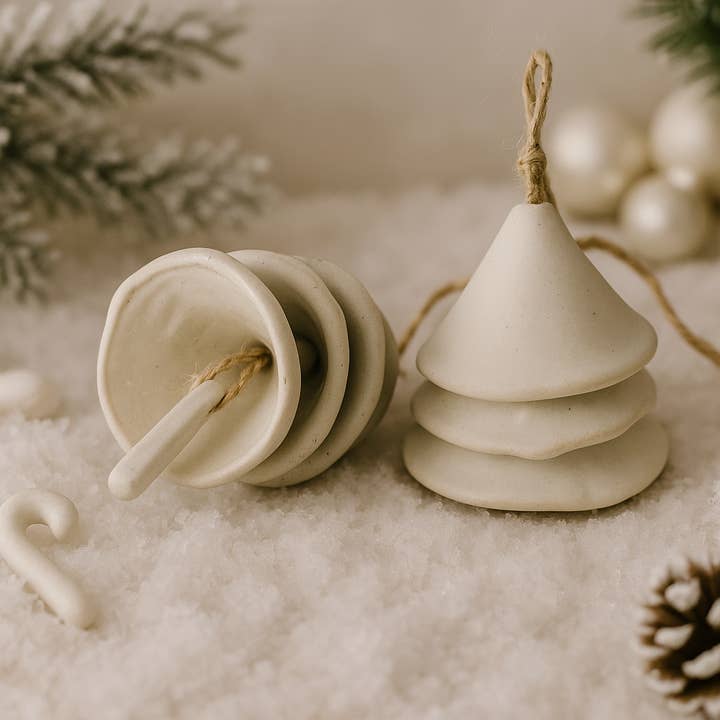 Snowdrop Bell Ornament, Handcrafted ceramic bell. for wholesale by Design by Pouneh