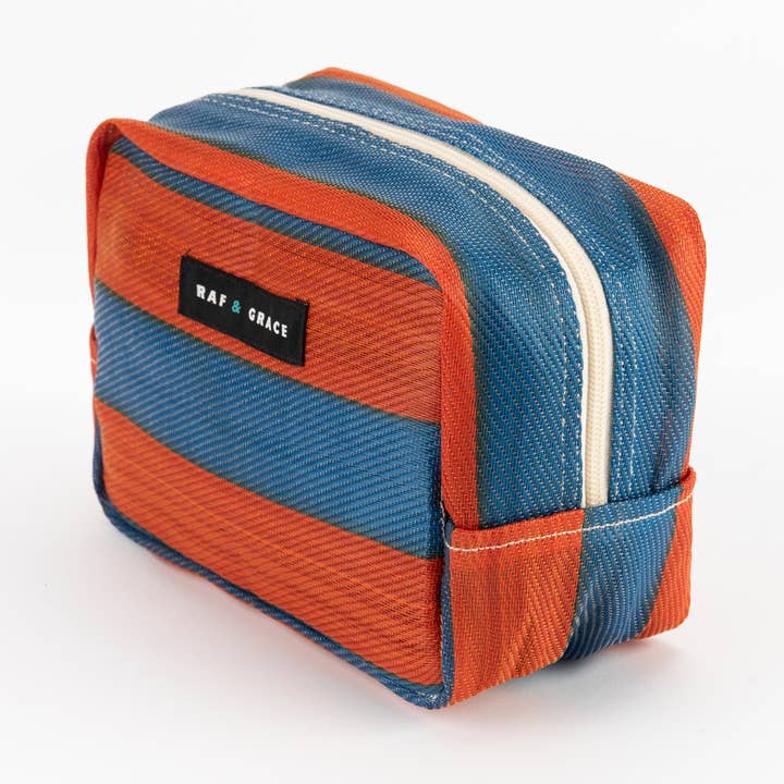 Navy/Orange Striped Recycled Plastic Wash Bag for wholesale by Raf & Grace